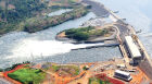 An aerial view of the Bujagali hydropower dam on River Nile, Uganda, Africa.<br />It is unfortunate that this article does not pronounce the heavy industries in Uganda that deserve energy cost price reduction. One can look on the heavy industries that consume lots of electricity and the economy is tremendously improved such as modern public transport. Modern electric transportation works directly with over 10 million passengers every day as humans travel and transform state economies tenfold. It is unfortunate that by 2043 there will still be no electric trains running some good African miles.