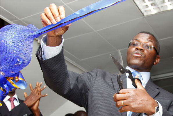 Buganda Kingdom prime minister Charles Peter Mayiga cuts